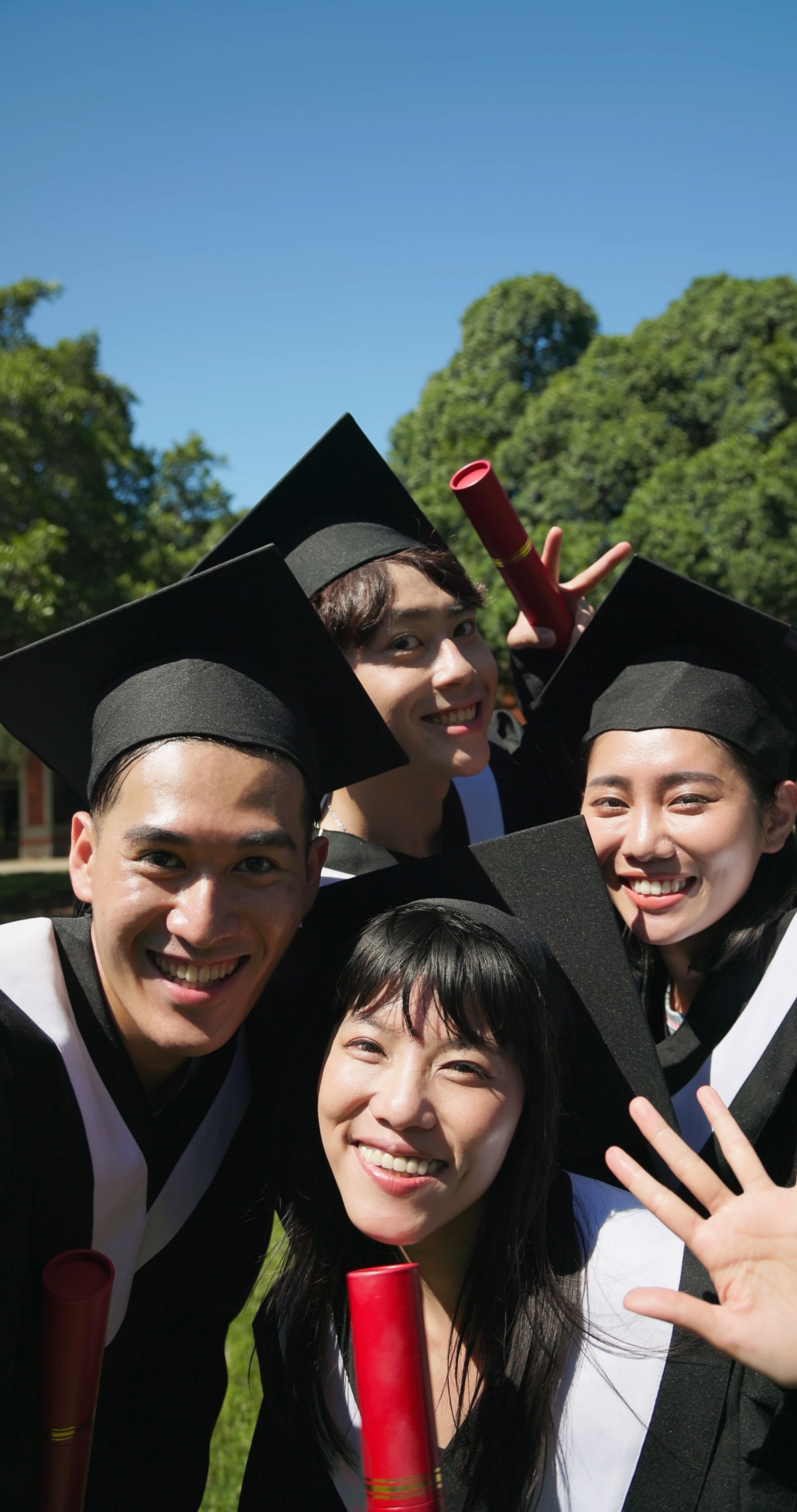group happy graduates students
